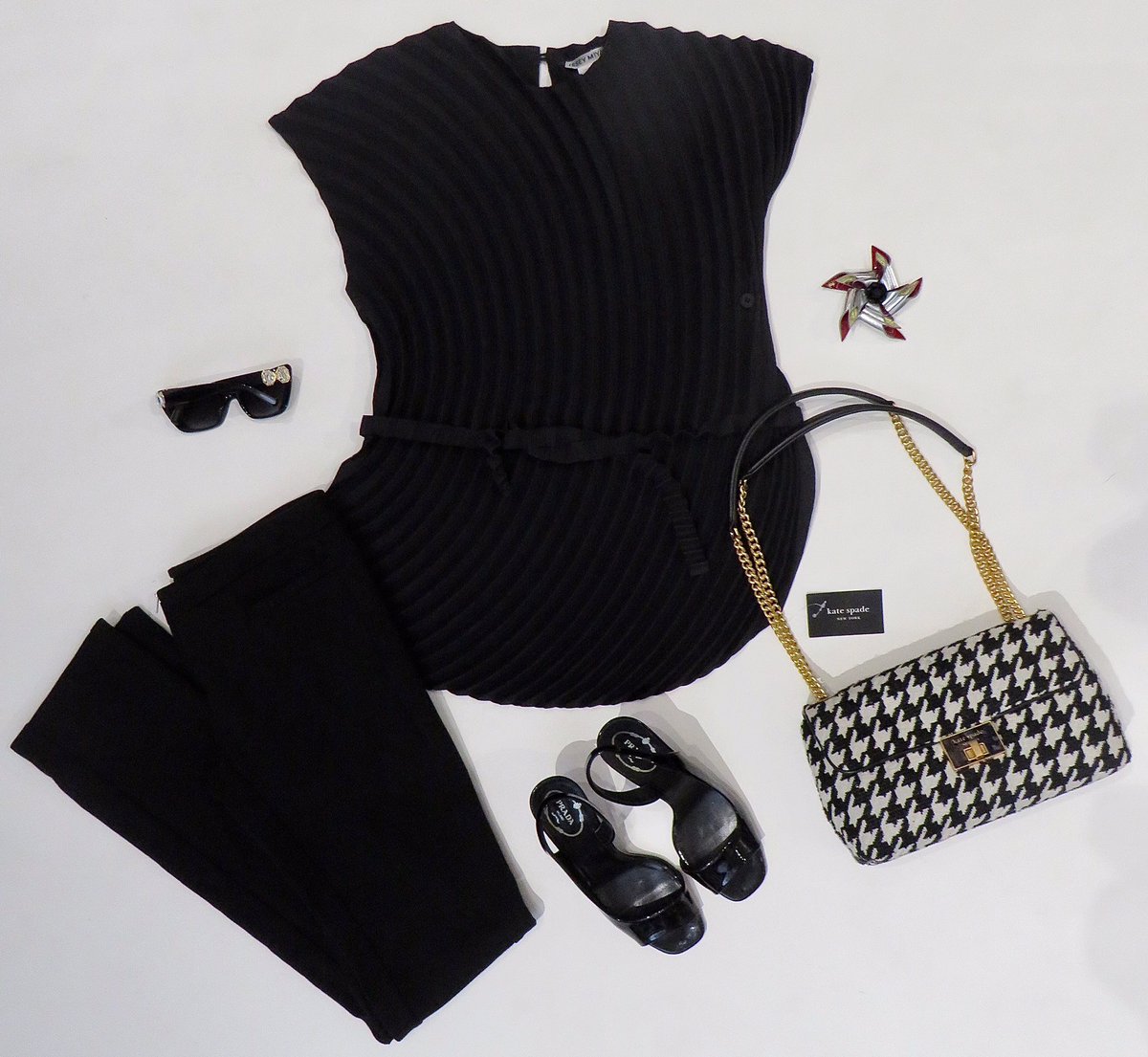 Classic chic pleats from #IsseyMiyake black pleat top, £150, Medium 🖤 #MiuMiu black stretch trousers, £40, UK 8 🖤 #Prada sling backs, £100, EUR 38 🖤 #Chanel leather brooch, £300 🖤 #KateSpade houndstooth sequin Evelyn bag, £200 🖤  #Swarovski 🕶 , £100 (RRP £230) 🖤 #ootd