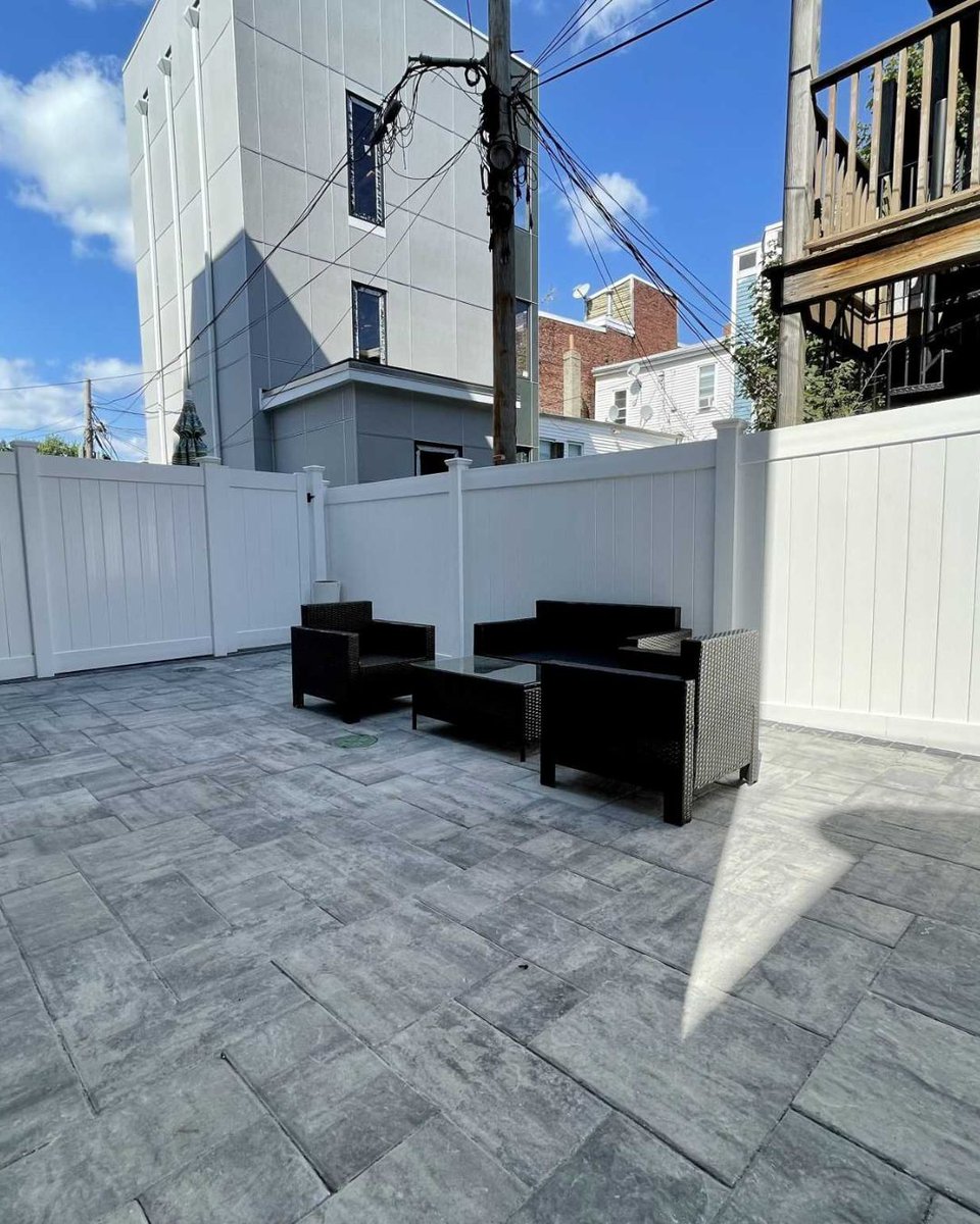 Combine a run-down single-family and a two-family home into one cohesive, high-value asset.

We had to demolish and rebuild significant portions of the lot while the direct neighbor stayed in their home. 

The outcome: