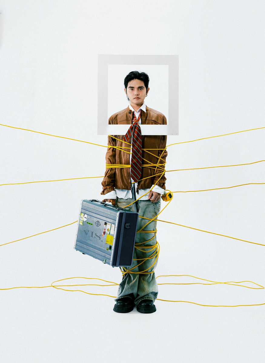 immamartian_'s tweet image. Pablo being tied by all these "connections" could also refer to his multiple roles in SB19 and 1Z: leader, songwriter, composer, producer, CEO, and mentor. He remains still, facing forward, upright because he's "tied" to his responsibilities. His holding a suitcase reminds me of