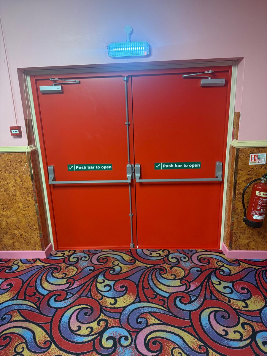 exec_windows's tweet photo. 🔴 Another commercial installation completed in Havant

Executive Windows recently fitted this steel; double fire-exit door at Crown Bingo — delivering maximum safety, durability &amp; a standout finish in 'Poppy Red'.

If your commercial premises needs upgrading, get in touch today. https://t.co/xi8FqfyY80