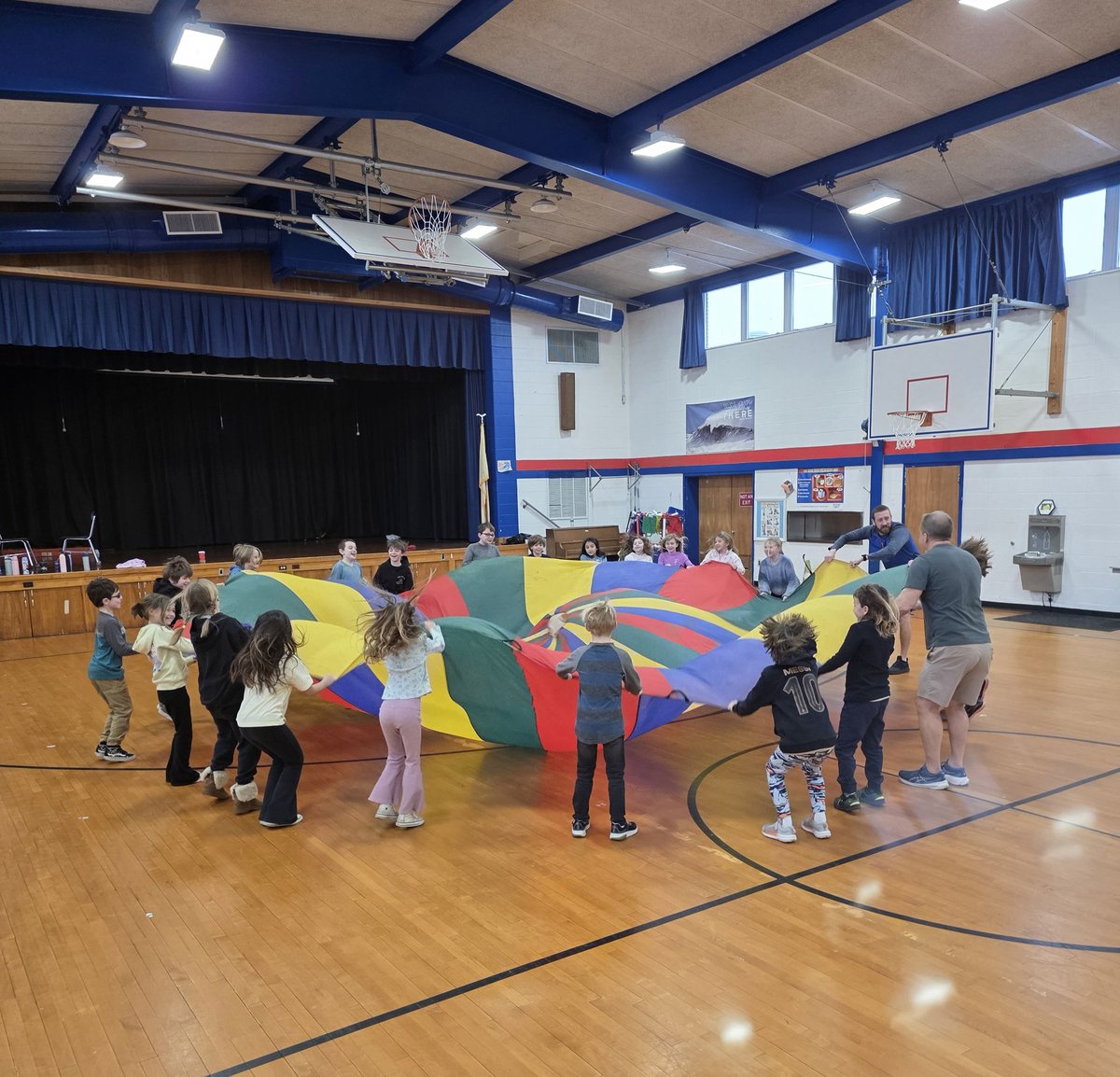 The parachute activity with third grade was so much fun! Students worked together to communicate and achieve goals.