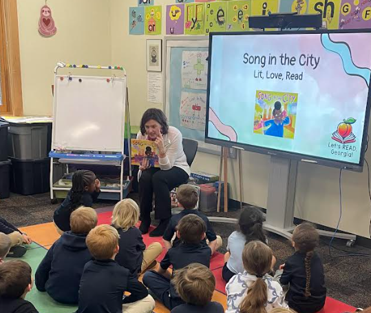 negaresa's tweet photo. ELA Specialist &amp; Let’s Read Georgia coach Jen Harper kicked off the Lit, Love, Read Campaign by reading with K &amp; 4th grade students at Lake Oconee Academy. Sparking joy, building language, and thinking about author, context &amp; purpose one story at a time. 📚✨ https://t.co/B24vLJRJZR