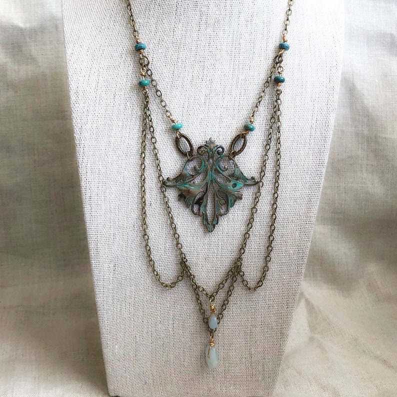 ellin_anderson's tweet image. Festive fairy-tale #necklace #handcrafted of brass and adorned with #aquamarine drops and #turquoise #beads. #SundanceStyle #handmade #artisan #jewelry #gift #Etsy #March #birthstone #MardiGras #Carnival #FairyTaleTuesday #Cinderella by #EdmundDulac, 1910. etsy.com/listing/709104…