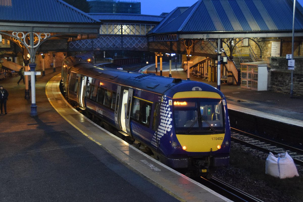 SteelCityDog_'s tweet image. A damp squib at Perth, as @ScotRail 170402 awaits time to head up to Dundee and eventually its final destination of Arbroath.

A slightly different angle on the same kind of shot, you can just make out the mechanical repeater on the left hand side! #TurbostarTuesday 
10/02/2026