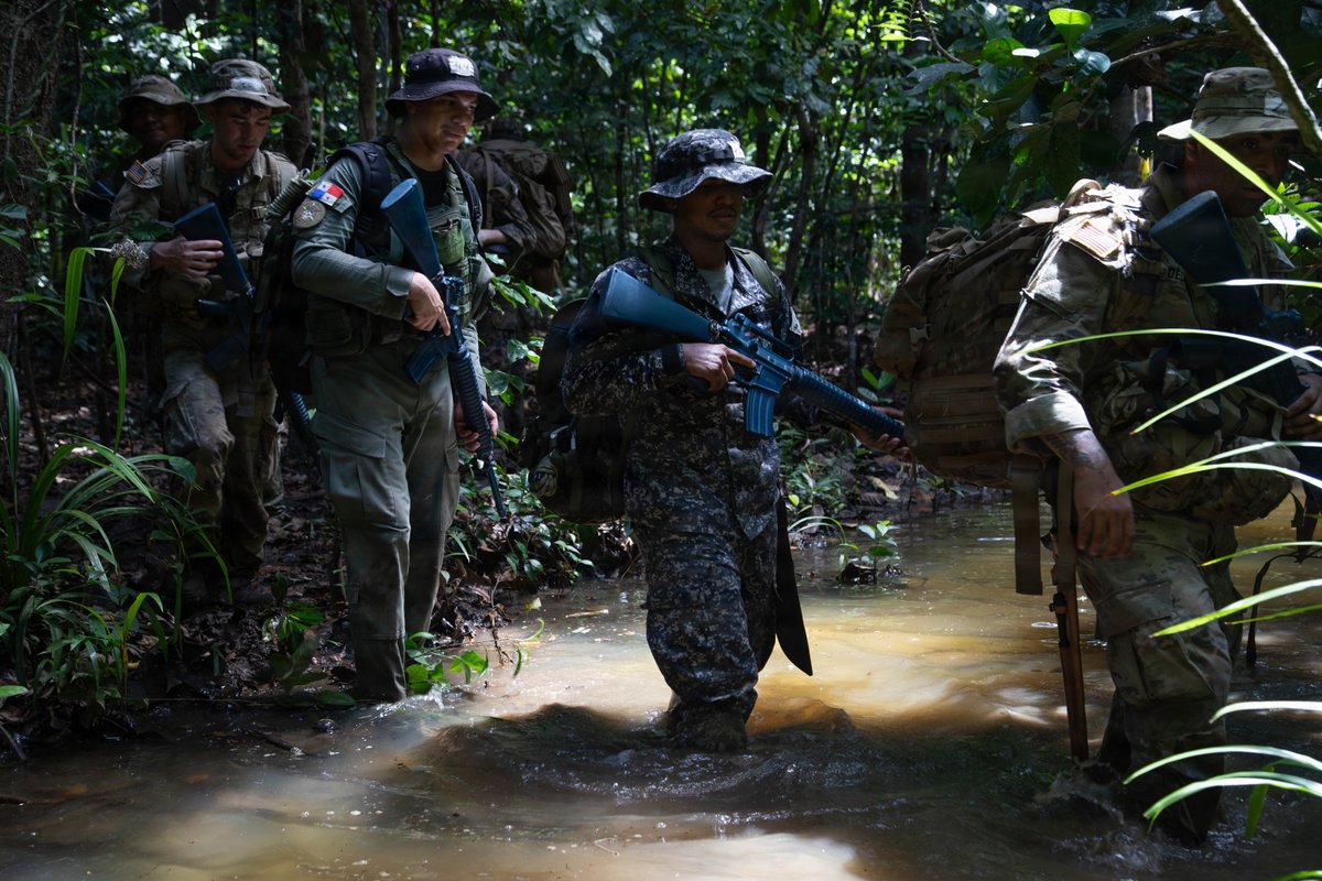 MARFORSOUTH's tweet photo. U.S. service members and Panamanian security forces conduct land navigation and ruck march training during Jungle Operations Training Course–Panama in Panama, Feb. 11, 2026. #USMC #PartnerForces #Readiness https://t.co/njkAEudQcm
