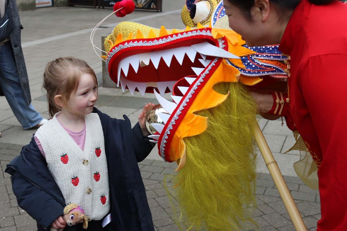 ChinesePTBO's tweet photo. Children watched in awe as the dragon came to life under the sun at Peterborough Cathedral. 🐉☀️
Some bravely reached out to touch it — smiles everywhere.
#ChineseNewYear #Peterborough https://t.co/5BWTf5ktZz