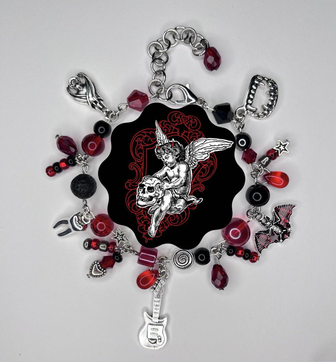 skeleta and bones shredder hand made bracelets available on my etsy! ❤️🦇 link in bio