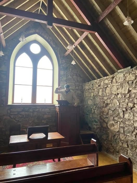 HillbillyHighl1's tweet photo. I'm in mourning. Our wee church at Tomdoun is going up for sale. They only sent a minister once a month, but it's where the glen could meet. The second pic is of a 5,000 year old bog oak crucifix inside. The last is of me, delivering a fiery sermon for my mate! Built in the 1860s https://t.co/S2g6gfbalw