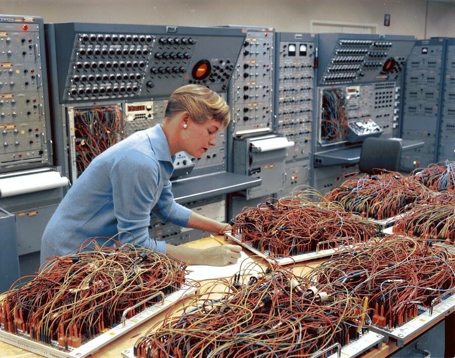 Engineer Karen Leadlay working on the analog computers in the space division of General Dynamics, 1964.