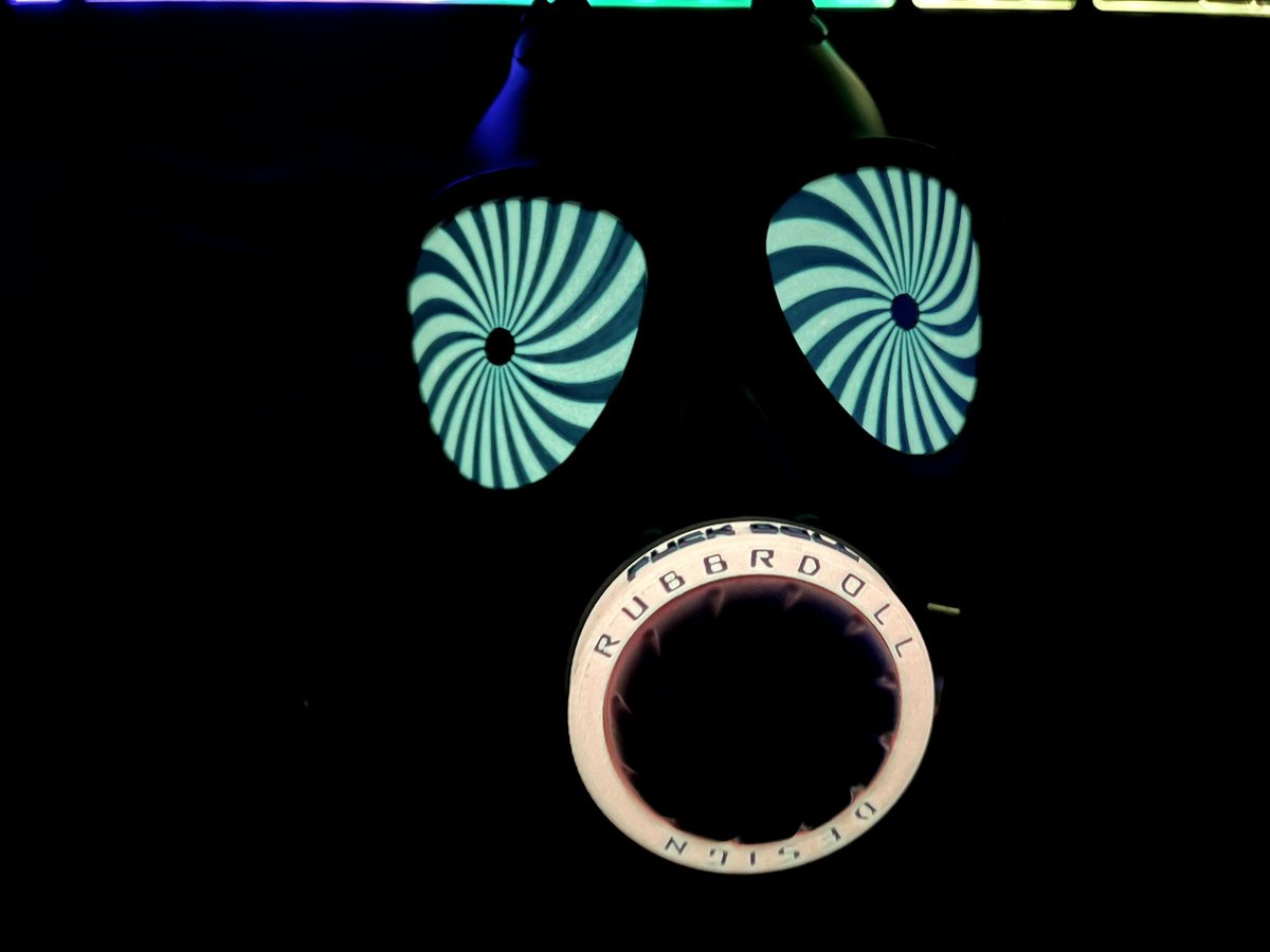 I have been working on this for the amazing <a href="/xxjessgrey/">Jess Grey</a>

UV pink with purple accents perfect for Hypno fuck sessions.

Under UV it glows super bright but when charged by light glows on its own in the dark room. 

#HYPNOTIZE #gasmask #drone #kinky