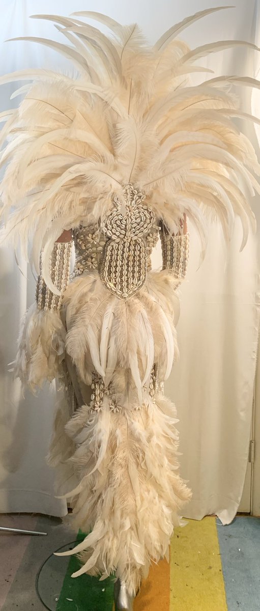 culture. 

I always try to incorporate my performance art into my suits.

Cowrie shells carry over 4,000 years of history, once used as currency across Africa and Asia, symbolizing wealth, fertility, protection, and divine femininity.

I took a more modern approach on this years