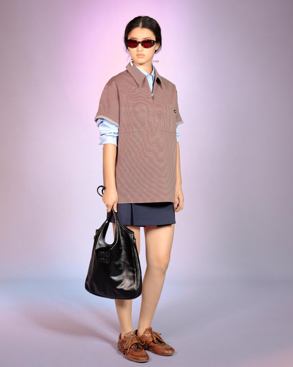 Miu Miu Manifeste showcases the brand's distinctive handwriting