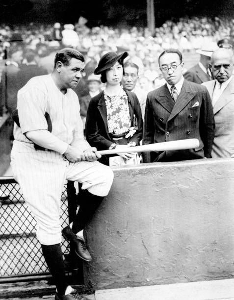 Babe Ruth holds an autographed bat for Prince and Princess Kaya of ...
