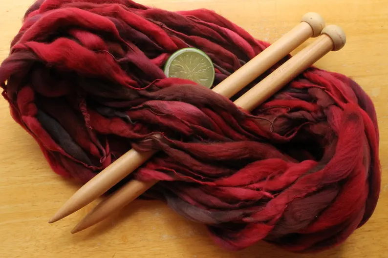 thefinelime's tweet image. I #handdyed #merinwool dark, rich, dreamy red.  It's sooooo soft!  I #handspun it in my fluffy, Signature Thick and Thin style. 

 etsy.me/40fXev3 via @Etsy