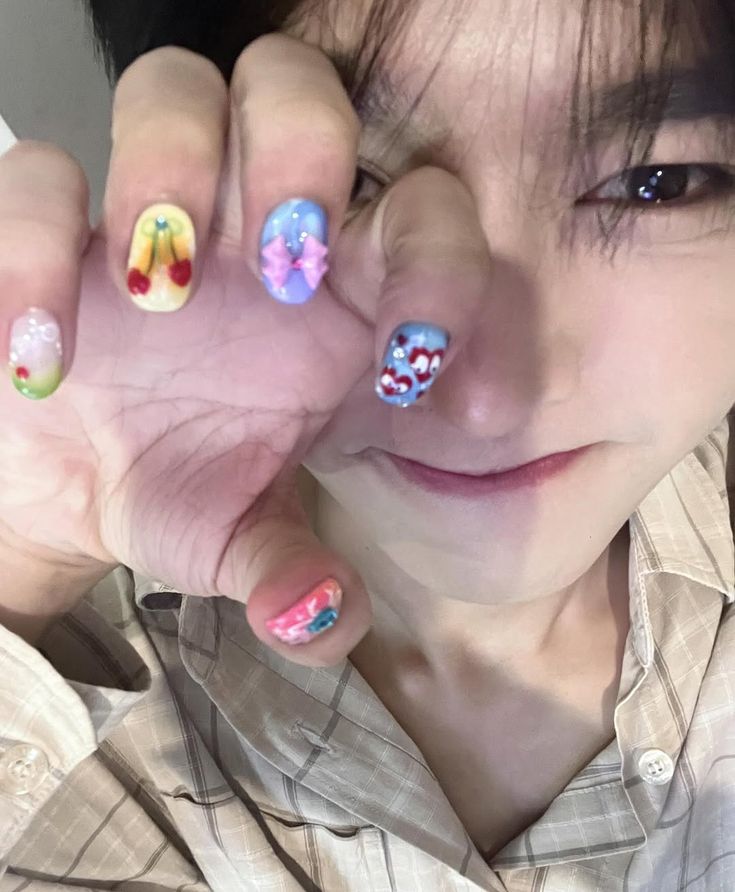 Such a cutie and omg i love the nail art (lowkey wishing he would get his nails done like this again)