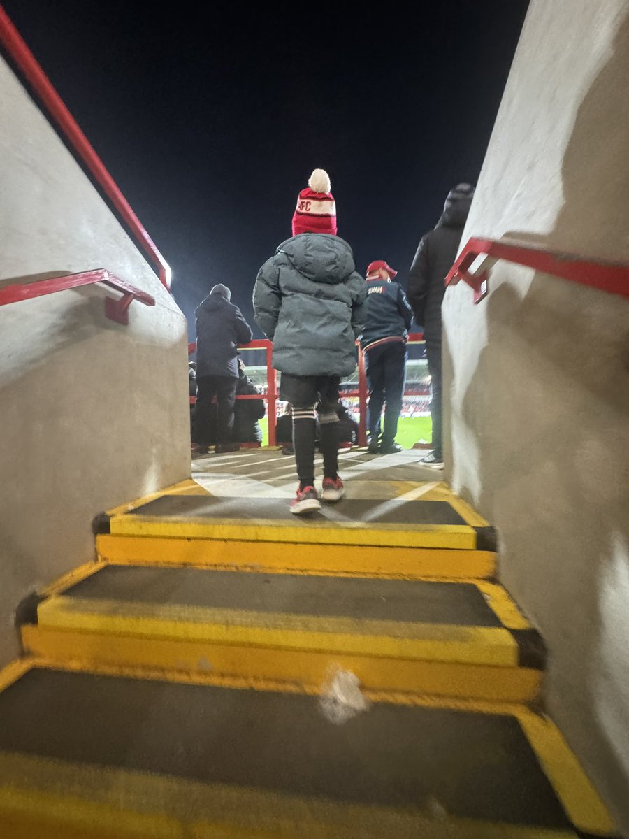 Night game under the lights with your 6 year old, who I know should be in bed, but can’t miss out on this crazy journey, making memories, like my dad did with me, this, what the football is all about, generation to generation, passing down the scarf #WxmAFC