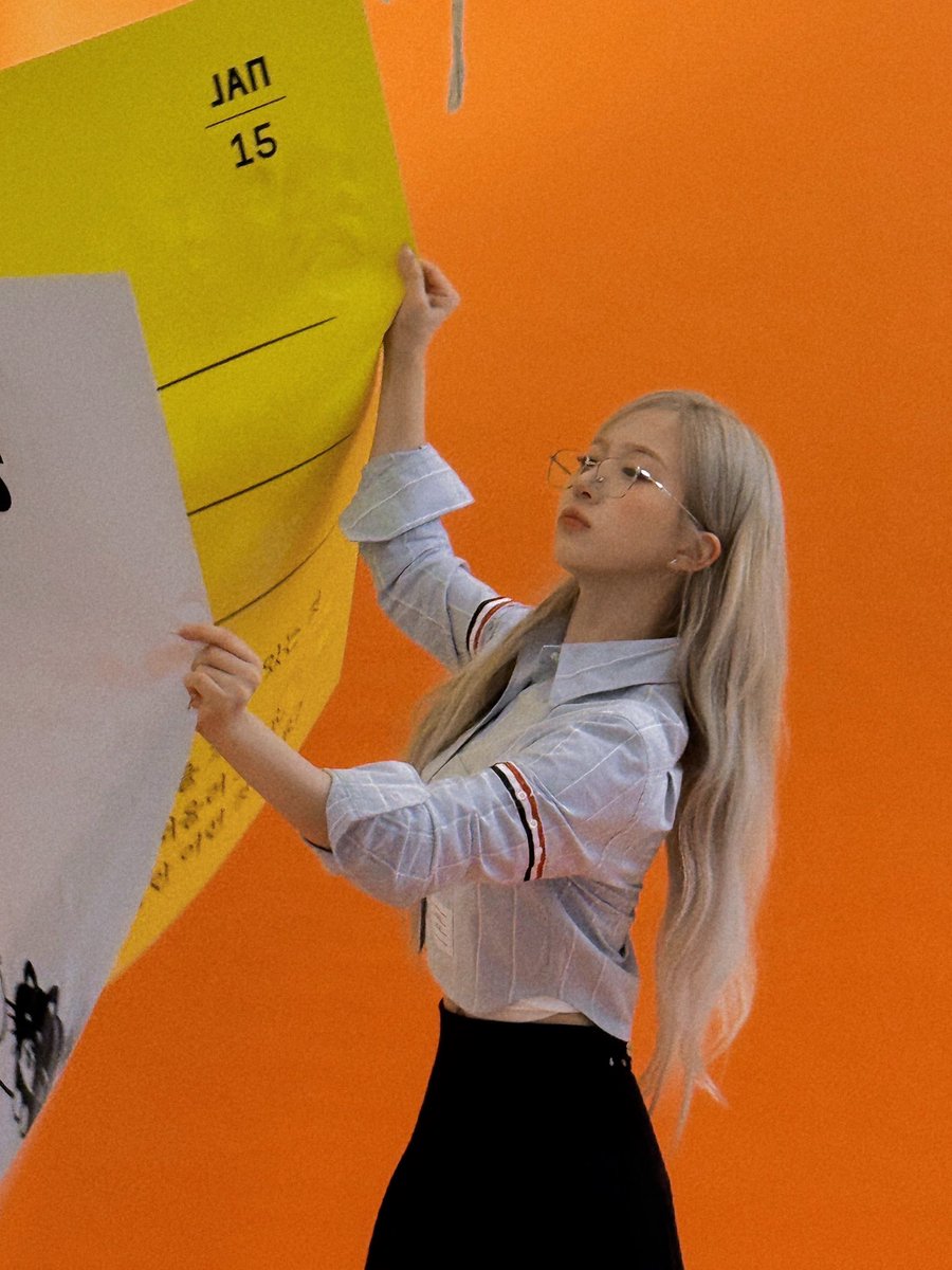 In the hush of the set, I trace the bold letters with a soft touch. Glasses on, heart open — there’s an effortless grace in embracing the unknown like this. ♡