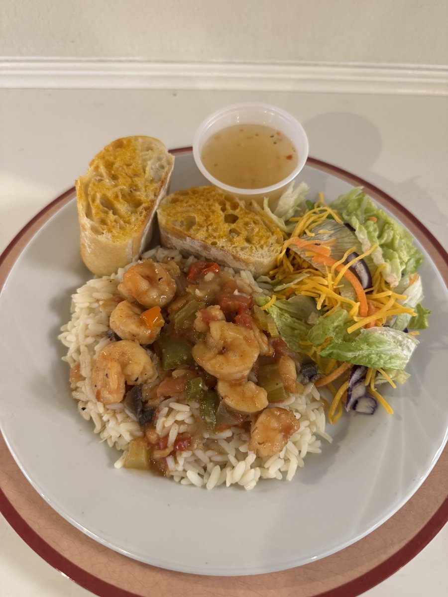 Shrimp étouffée with a salad and breadsticks. Made by me. 😊