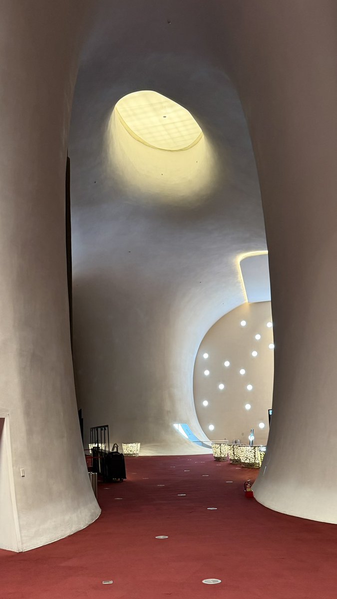 saintgumi's tweet photo. i visited a theater that looks like a bitten apple 🍎 https://t.co/RHUyJhyN02
