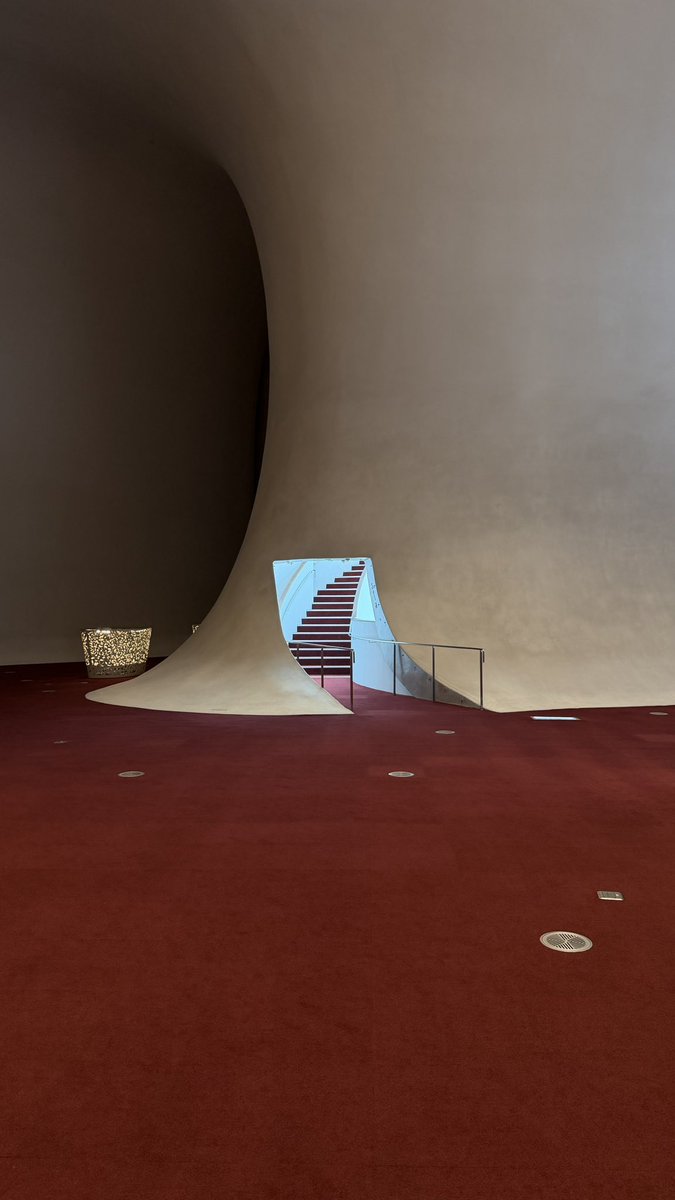 i visited a theater that looks like a bitten apple 🍎