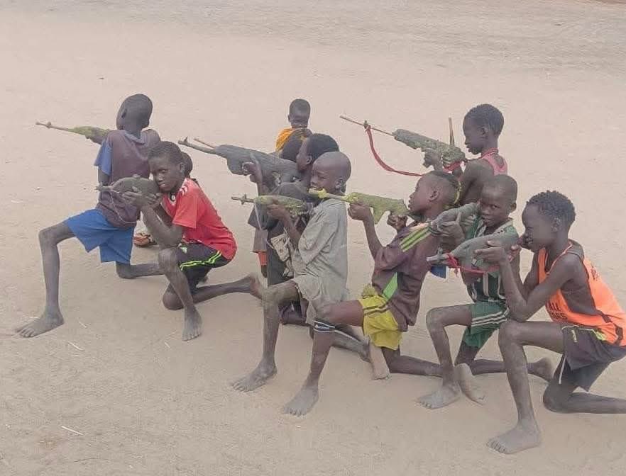 Malualbk's tweet photo. Children should carry books, not echoes of war.
When play mirrors violence, it tells us the environment must change. Our duty is to protect childhood and build a future where the only fight is for education, opportunity, and peace.
#UnityCatalyst #MBK #MBK2026 #SSOX #SouthSudan https://t.co/EyIo0zWZf9