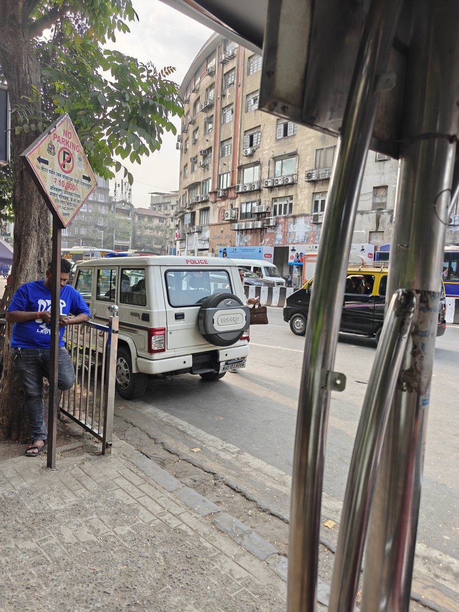 Kaustub25628186's tweet photo. Whether Traffic Rules are applicable to the Citizens only and Law Enforcement (Police) are exempted from the Traffic Rules e.g. No Parking Near GPO Bus Stop with "No Parking" Warning board as on 18.02.26 - 09.15 hrs🤔 https://t.co/1f6ApUKHsS