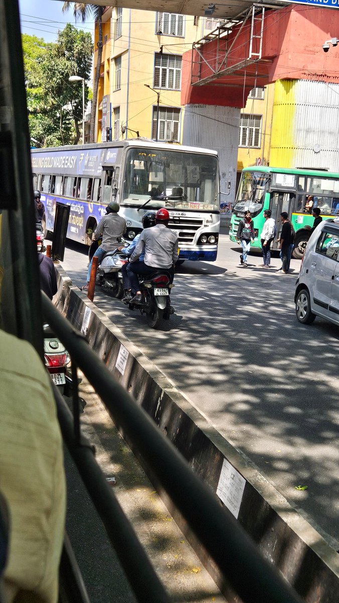 prasad_'s tweet photo. @BlrCityPolice traffic violation near Navrang. Driving beyond barricade and blocking vehicle from opposite direction.  For your action please https://t.co/yVquFfe4SB