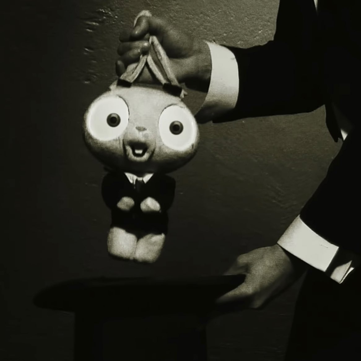 eastistyler's tweet photo. the analogy between the man pulling the rabbit out of the hat and how Torchbearer helps Clancy escape from the demons in his head..it’s so deep guys, this mv has incredible potential. https://t.co/3hLyENmw4k
