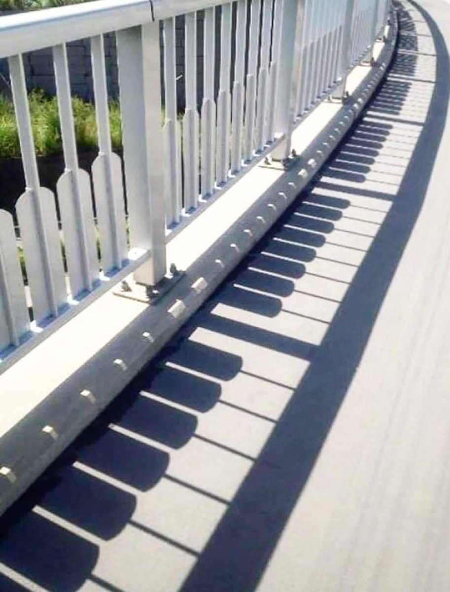 Praise the Architect for this railing shadow.