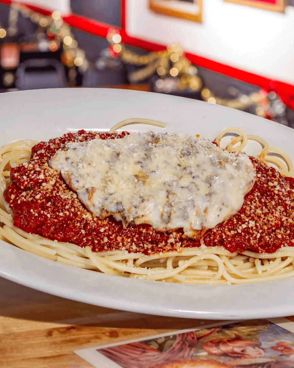 Try our Chicken Parmesan, a delicious twist on a timeless classic! 🍴Spaghetti smothered in Italian meat sauce, topped with a perfect chicken breast, melted mozzarella, and a sprinkle of grated parmesan cheese. Comfort food at its finest! 😍 gaslightpizza.com