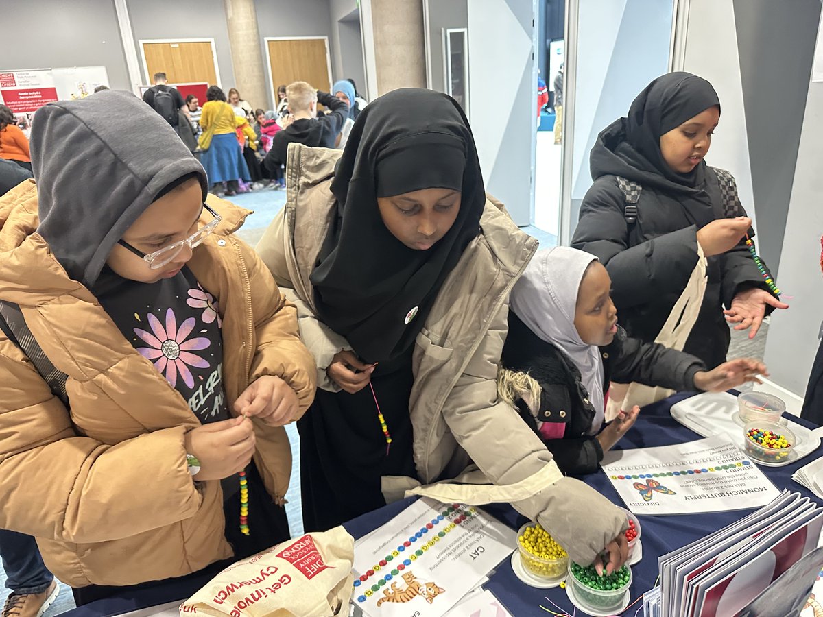 theWCRC's tweet photo. The Wales Cancer Research Centre (@theWCRC) had a fantastic time at #BeAScientist on Monday! 
So inspiring to see so many children excited about science - they loved our DNA bracelets and anatomical body Ted! Thanks to our brilliant researchers for making it happen 🙌 https://t.co/Ncv9vewrfZ