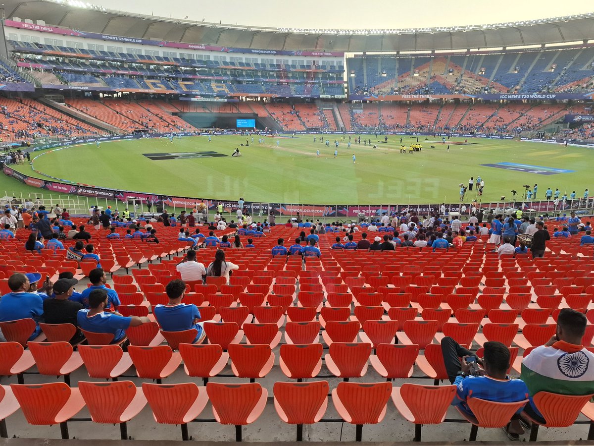 rkmrasesh's tweet photo. Incidentally, ground seating at Ahmedabad is orange and blue #IndvsNet #T20WorldCup https://t.co/gHNEB81DUb