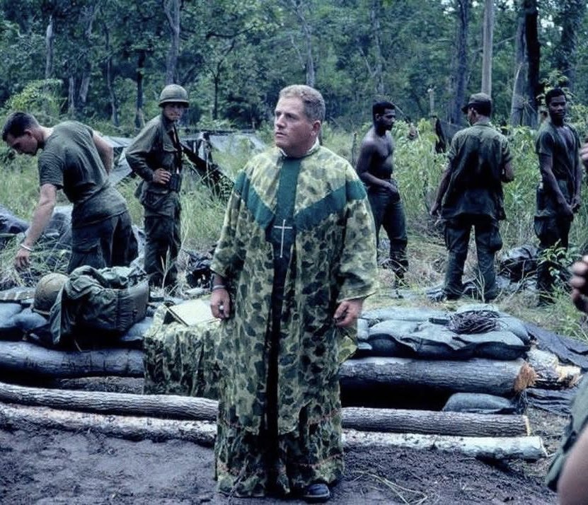 a US army chaplain wearing a camouflage cassock during the vietnam war (1968)