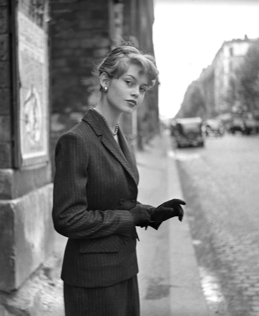 oldmovieactress's tweet image. The girl who stopped traffic. 🛑✨

Caught in a quiet moment on a Parisian street, Brigitte Bardot proves that true style is timeless. Even in a simple suit, she has that undeniable "It Factor" that made the world fall in love with her.

#VintageVibes #BrigitteBardot