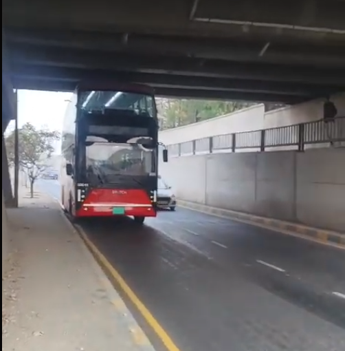 AMTS Double-Decker Bus Gets Stuck Under Gandhi Bridge on Sabarmati River Drive