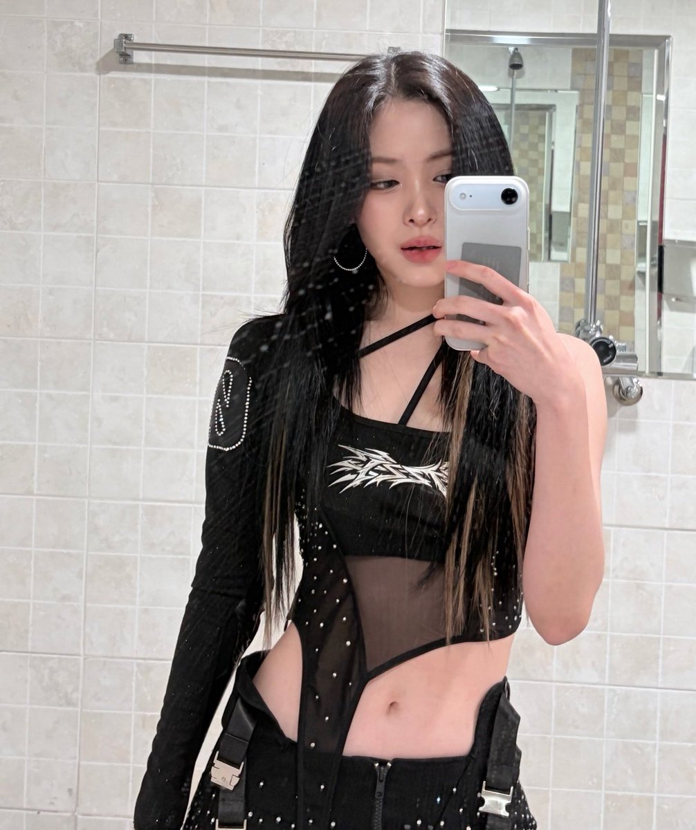 unbuckling her belts for the pic is crazy work