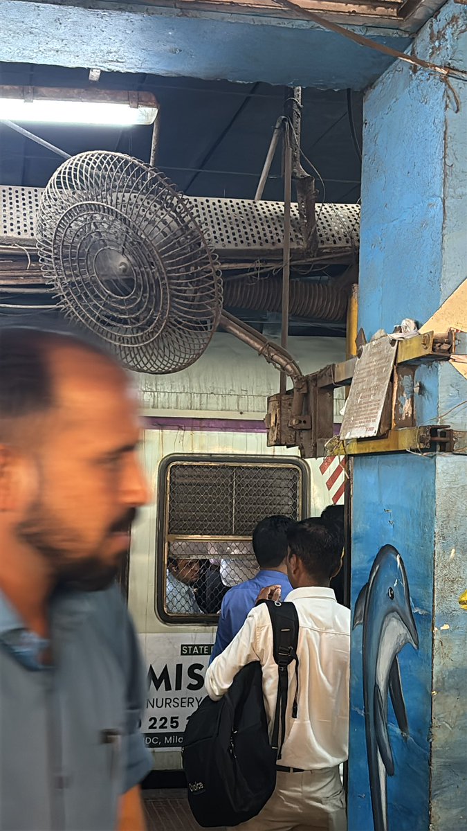 Rusted fan, pipes and dangling wires. All covered with years of dust. A scene from Ghatkopar CR station. Not sure when, if it was ever cleaned!