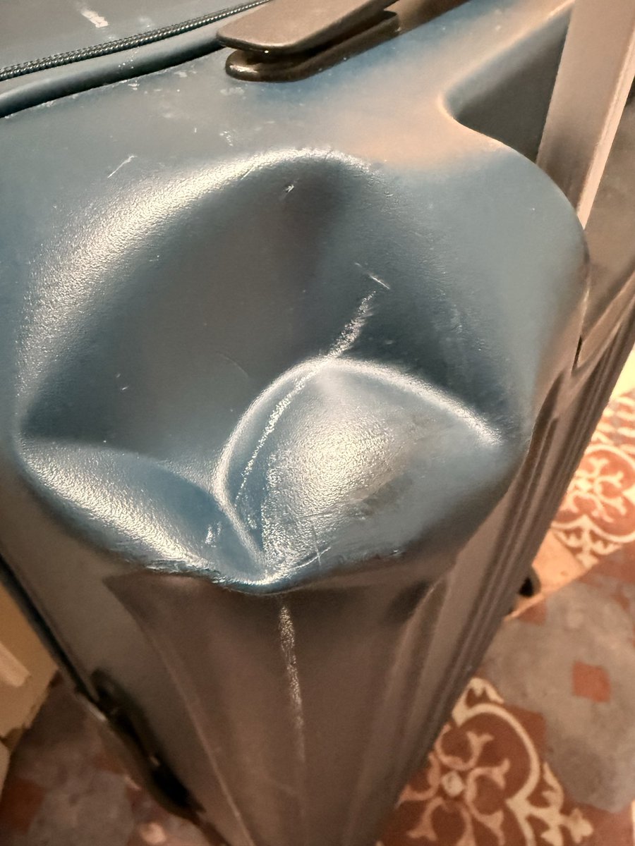 rmcg13edin's tweet photo. A ‘robust hard shell design’ to give ‘reliable protection’ - yet not one but both of my M&amp;S Amalfi cases have been damaged easily - does this look robust to you @marksandspencer   Cracks and dents suggest cheap and weak to me??? https://t.co/rKrMYHopiQ