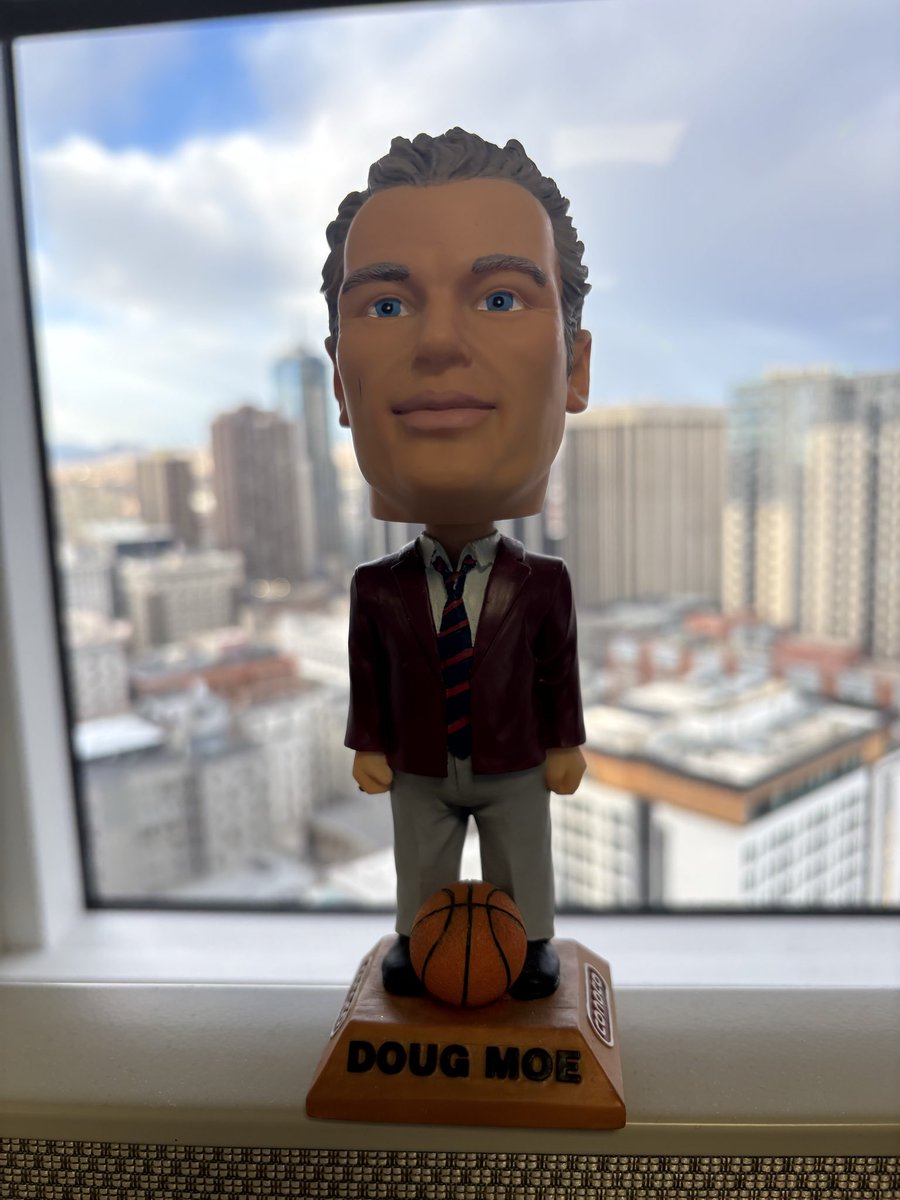 AaronLopez's tweet photo. Our loss is heaven’s gain. I keep this Doug Moe bobblehead at my desk as a reminder of how lucky I was to know him as a coach and a friend. He was one of a kind. https://t.co/0lWcFCiOND