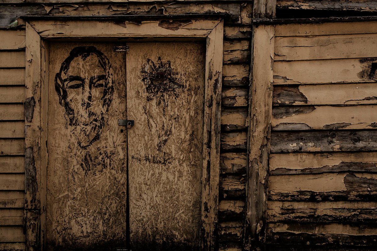 A face on the decaying wall