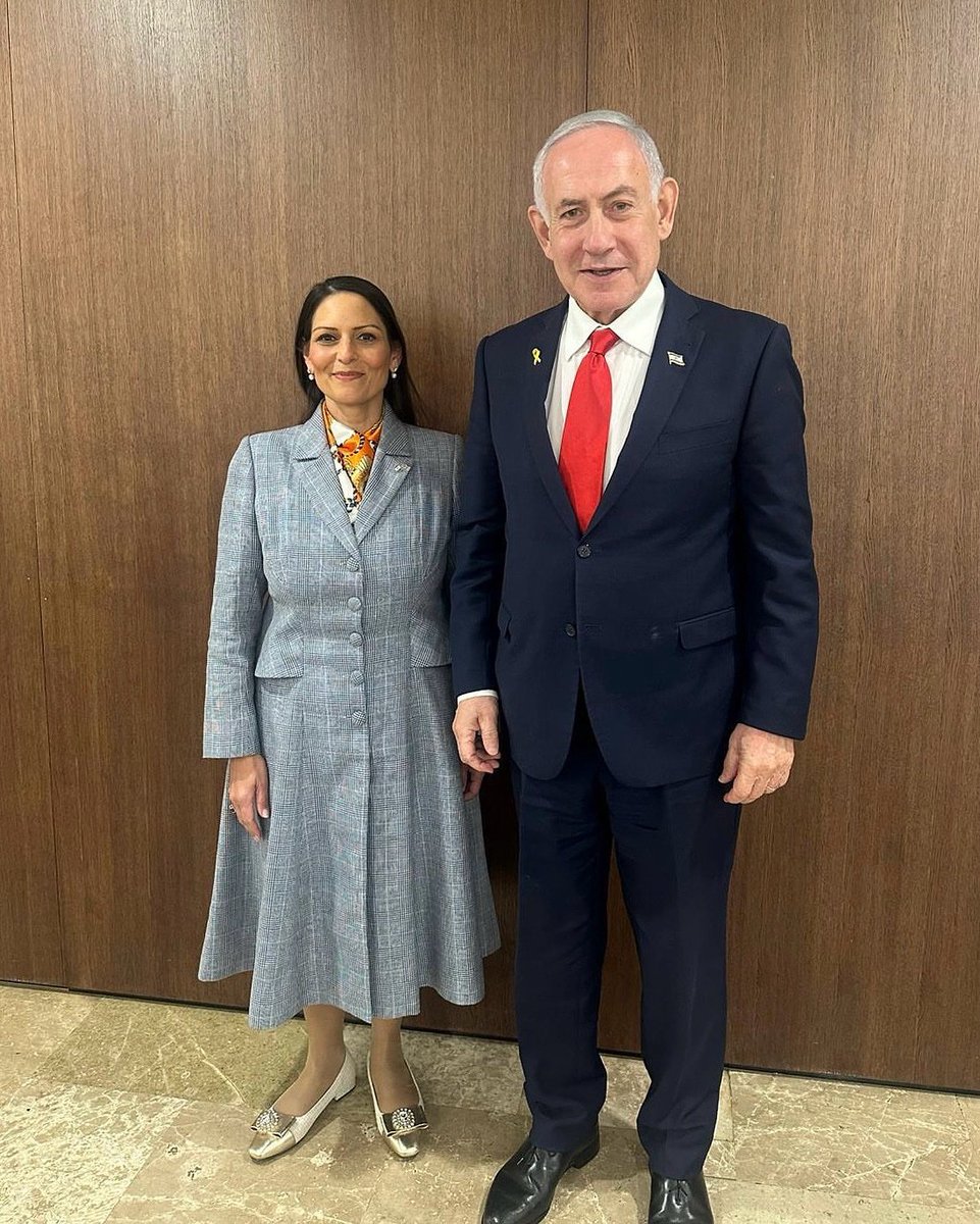Priti Patel was forced to resign in 2017 after holding 14 unofficial meetings with Israeli ministers, businesspeople, and a senior lobbyist.

In 2025 she stood proudly alongside genocidaire Benjamin Netanyahu, who is wanted by the International Criminal Court for war crimes.