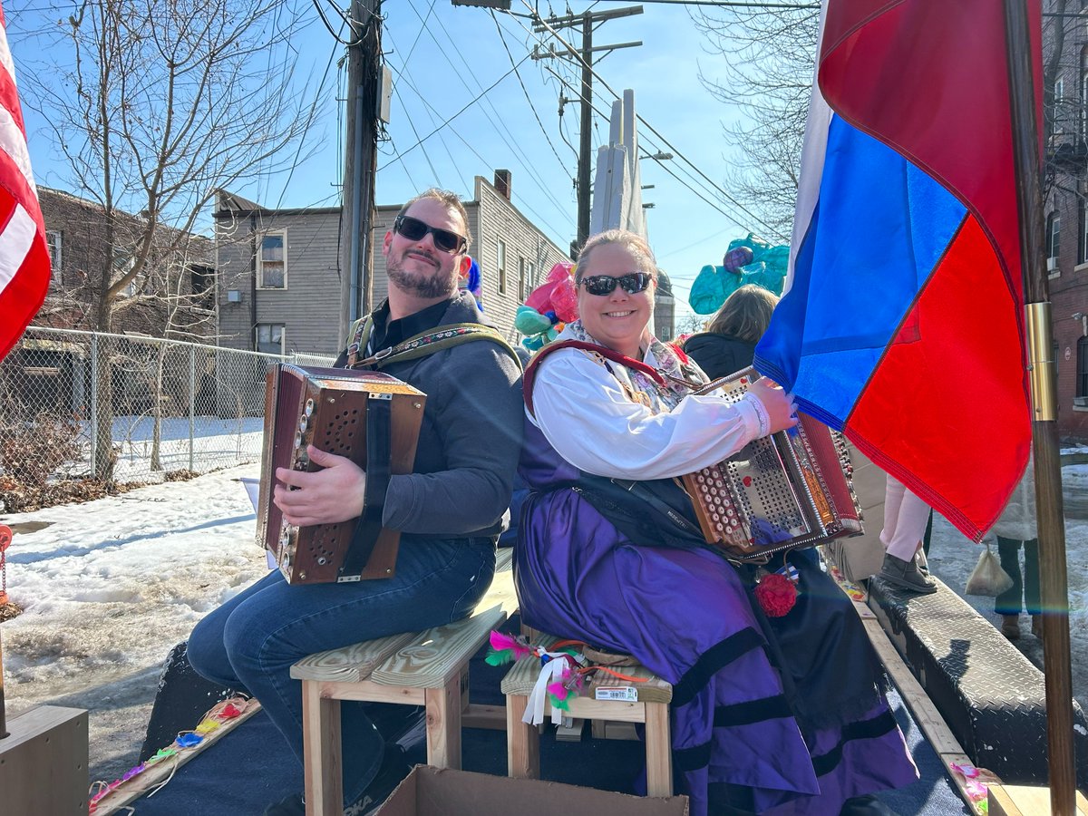AMLA_SDZ's tweet photo. AMLA Members and friends enjoying the @ClevelandKurentovanje parade on the AMLA float!  AMLA Members handed out cow bells to the revelers to help them scare away winter!! #amla4life https://t.co/Y6DT3CPU4j