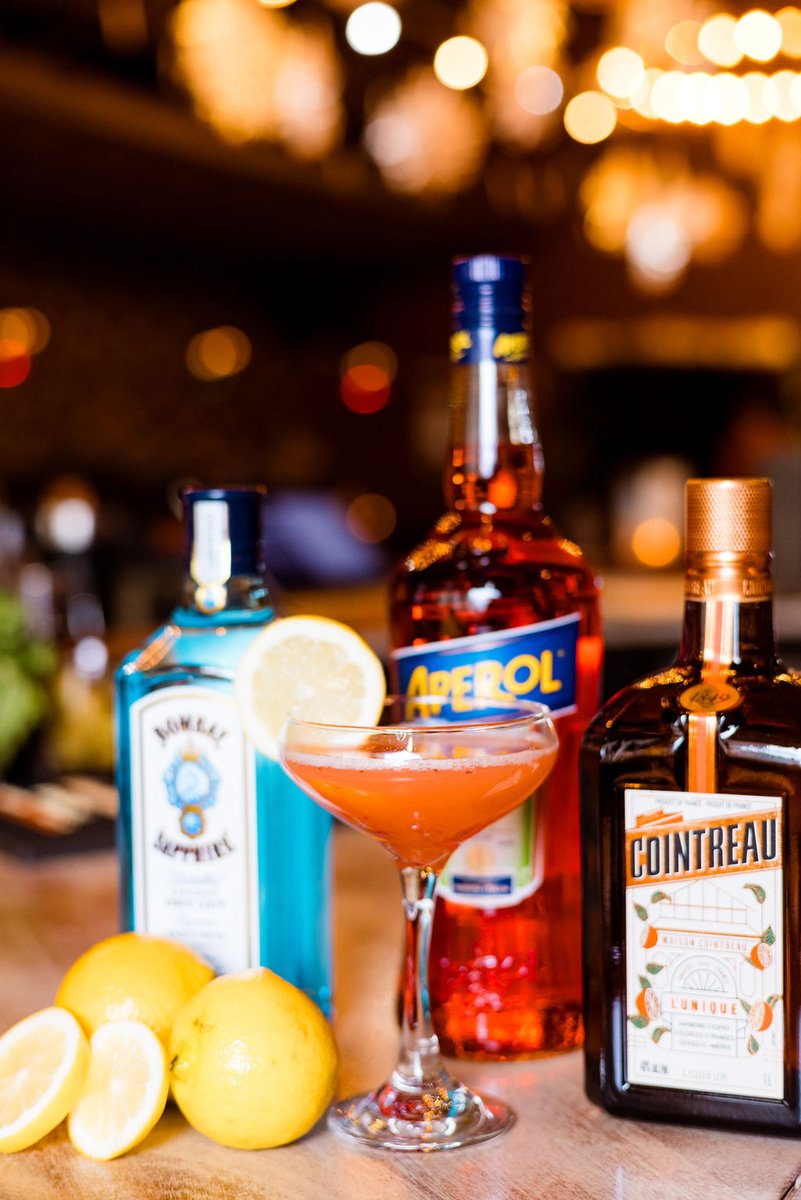 Thirsty? Feature of the week! 🍓 First Lady: Bombay Sapphire Gin, Aperol, Cointreau, fresh lemon, simple syrup, and muddled strawberry.