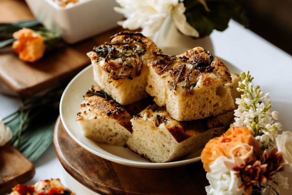 GreenMillCaters's tweet photo. 𝑭𝒐𝒄𝒂𝒄𝒄𝒊𝒂 𝑶𝒏 𝑭𝒍𝒆𝒆𝒌 ✨

2026 is all about flavor forward, shareable bites, and our focaccia boards are totally leading the trend. Golden, airy, and loaded with toppings, they’re perfect for any gathering that deserves a wow factor. https://t.co/9eh9Q5hytC
