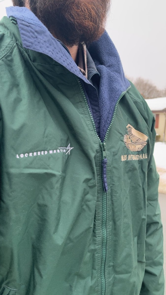 MilitariaAddict's tweet photo. One of the best finds I’ve gotten off of eBay, Lockheed Martin MLRS International Team windbreaker for 60 bucks https://t.co/RzM7UZHtMT