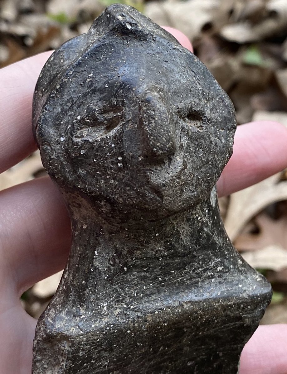 This is a broken (sadly) stone-carved effigy, known as a “Rim Rider.” It contains a small pebble inside, which rattles when shaken and would have been attached to the side of a bowl. This example was found in a plowed field in southern Missouri.

It was created by Indigenous