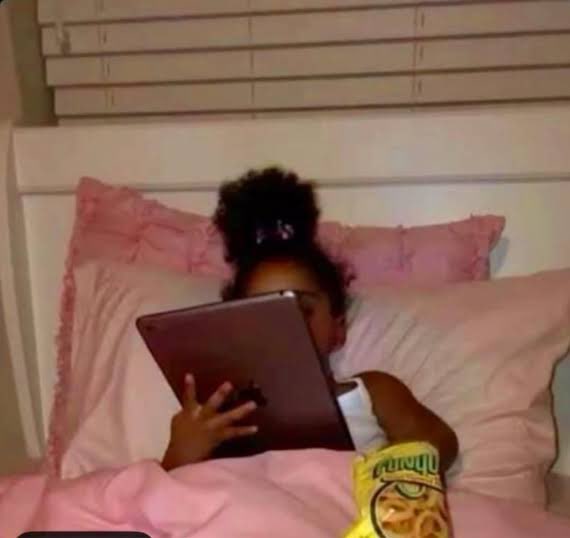 Me in my mom’s bed after she leaves the house