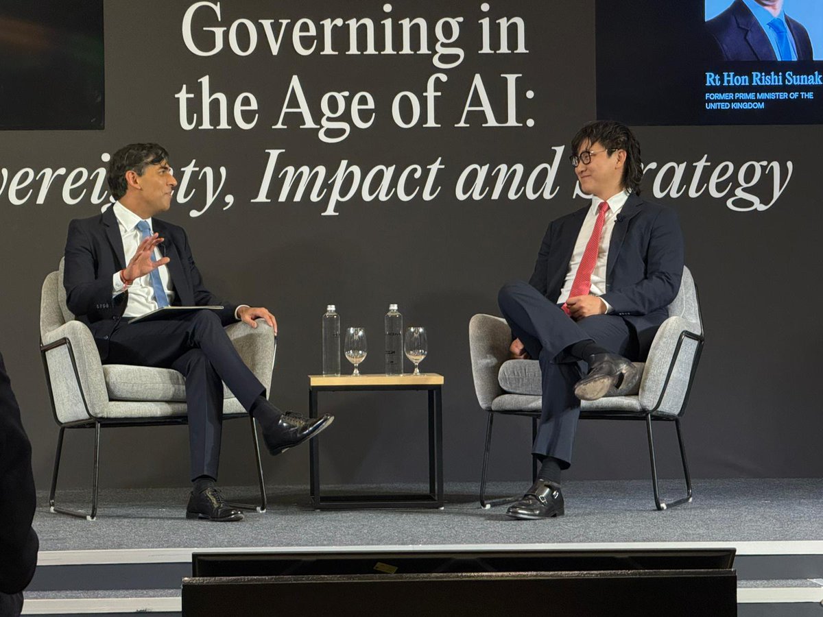 RishiSunak's tweet photo. Great to be back in India for the AI Impact Summit - the summit series Britain started when I was Prime Minister.

Today the focus has rightly shifted towards adoption, and India is well placed to lead. https://t.co/3Af16kvxLR