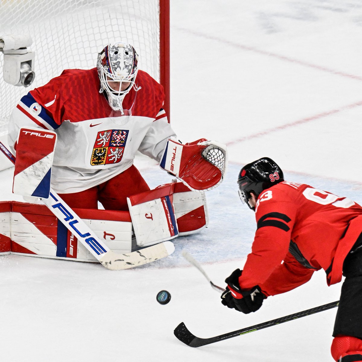 Sportsnet's tweet photo. CLUTCH BACKHANDER BY MITCH MARNER 🇨🇦🚨

NO. 93 COMES THROUGH FOR CANADA IN OT 😤 #MilanoCortina2026 https://t.co/V7ymBf38d9
