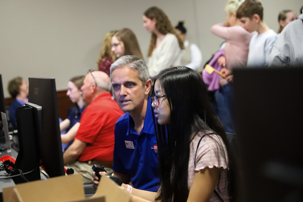 20 students from BGJHS attended the IdeaFestival at WKU with a morning of speakers and afternoon of minds-on, hands-on activities. Pictured are students in the event’s makerspace, creating paintings and puzzles, making smartphone microscopes and flying with a flight simulator.